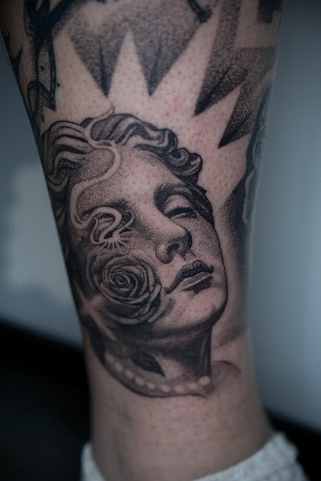 Black and grey realism tattoo by Saito Ink